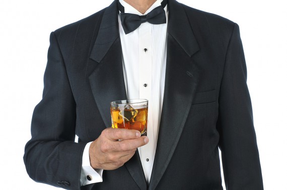 bigstock_Manin_Tuxedo_Holding_Cocktail_5193276